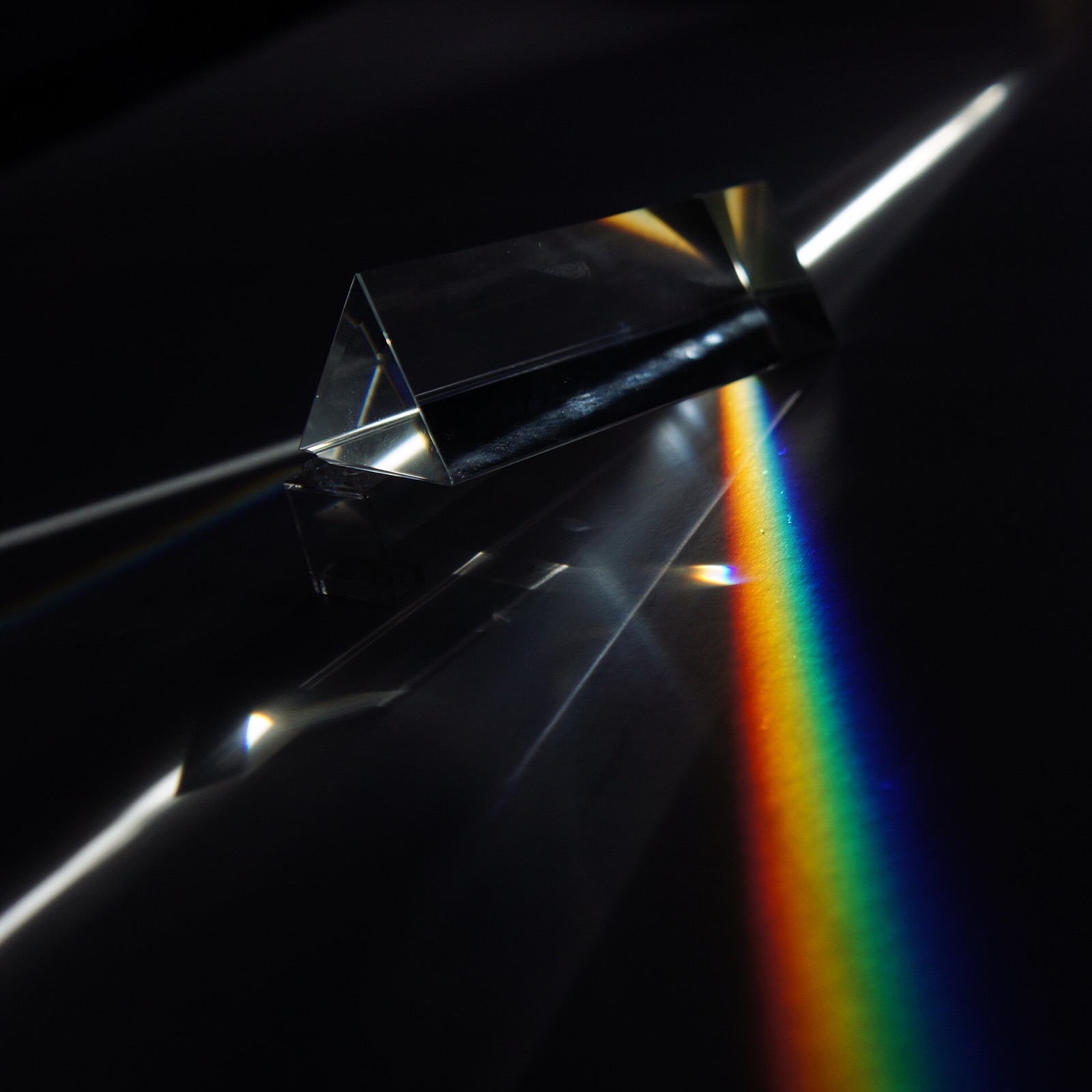 White light dispersed into a spectrum through a glass prism